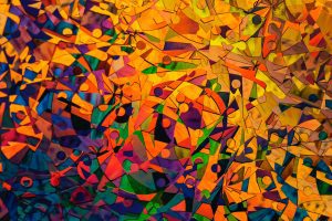 Abstract art in predominantly orange, with a bit of purple and green scattered throughout.