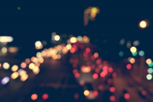 Bokeh lights of a busy highway, taken from above.