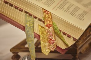 Missal with various bookmarks used as a book for the readings during the celebrations of the Masses in the Catholic Relicion.