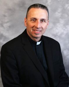 Reverend John J. Victoria